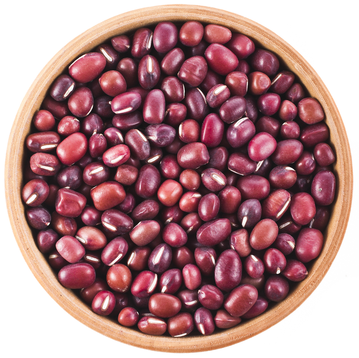 Overhead shot of uncoooked red beans in a wooden bowl