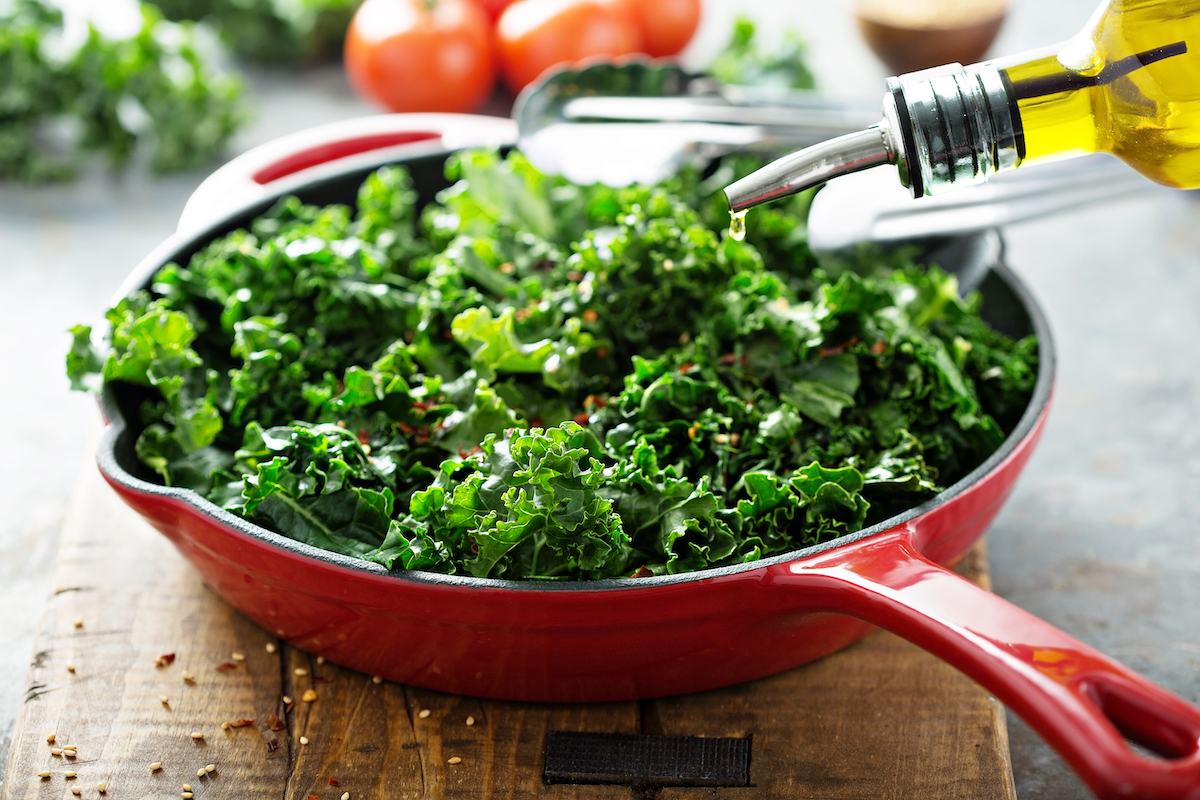 sauteed kale in a large red skillet
